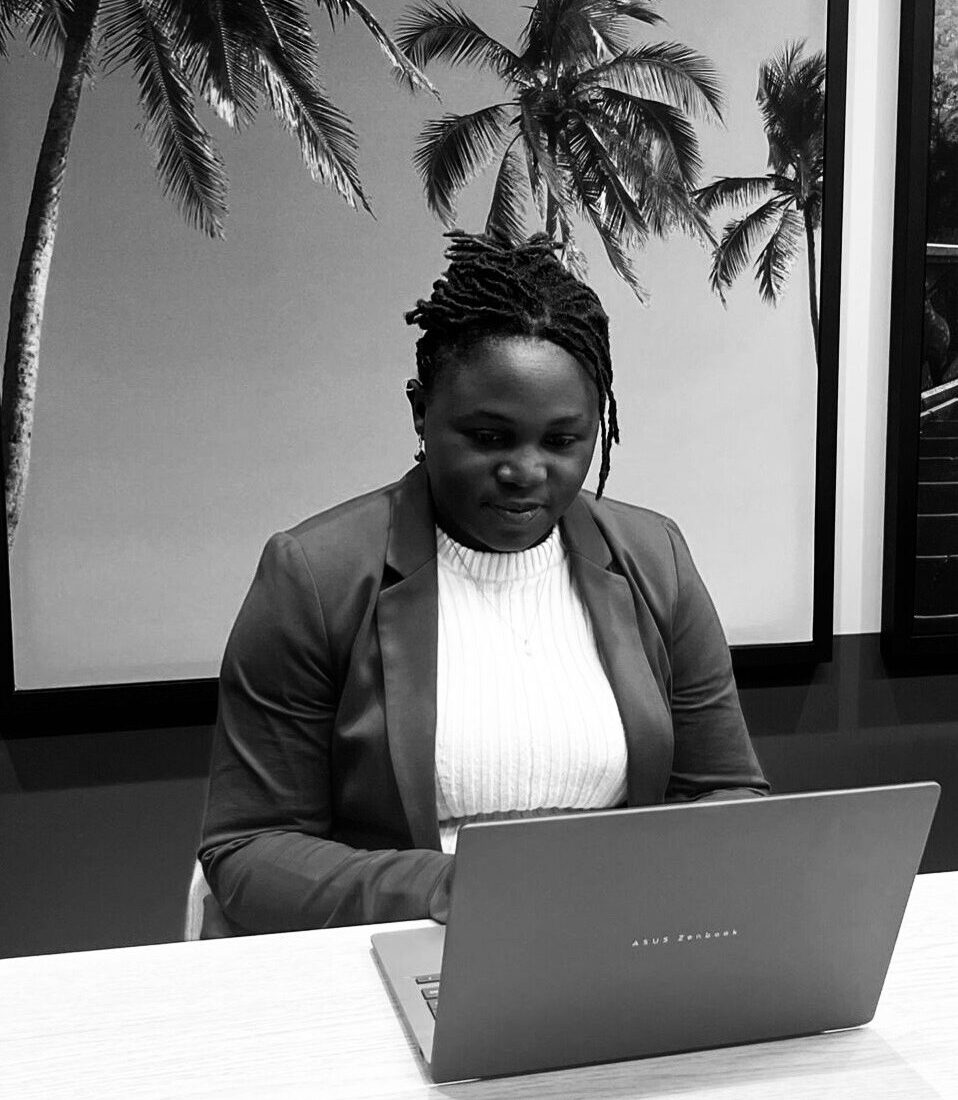 Winnie working at her laptop